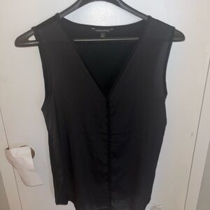 Banana Republic woman’s black top. Size Medium. NWOT. 100% polyester. New